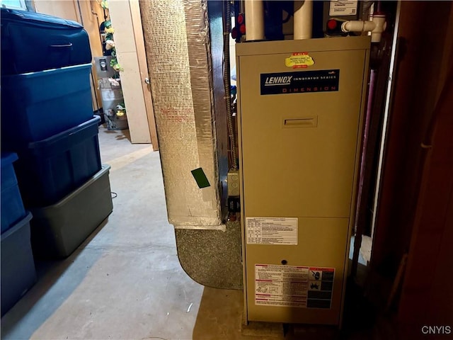 550 Sayles St, Oneida-Inside, NY 13421 - utility room featuring heating unit