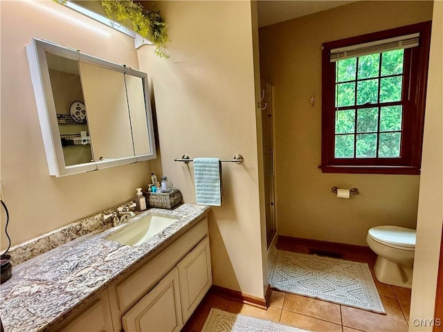 550 Sayles St, Oneida-Inside, NY 13421 - bathroom with vanity, a stall shower, and tile patterned flooring