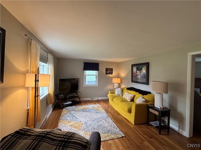 301 Loma Ave, Syracuse, NY 13208 - living room with wood finished floors and baseboards