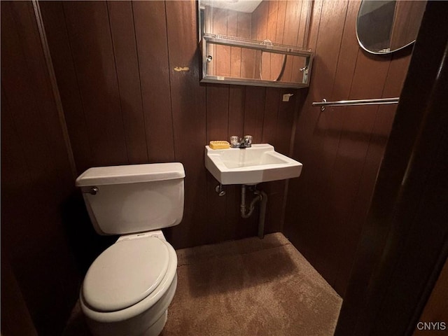 301 Loma Ave, Syracuse, NY 13208 - bathroom with toilet and wood walls