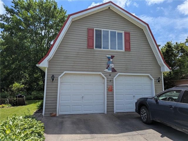 12941 Hillcrest Dr, Carlton, NY 14411 - garage featuring concrete driveway
