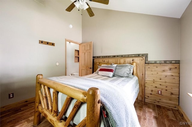 146 Mohawk Dr W, Webb, NY 13420 - bedroom with wood finished floors, high vaulted ceiling, and a ceiling fan