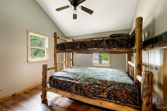 146 Mohawk Dr W, Webb, NY 13420 - bedroom with vaulted ceiling, wood finished floors, and a ceiling fan