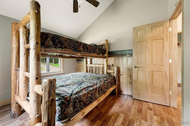 146 Mohawk Dr W, Webb, NY 13420 - bedroom with wood finished floors, lofted ceiling, and ceiling fan