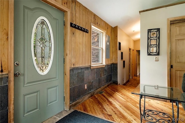 146 Mohawk Dr W, Webb, NY 13420 - foyer entrance with electric panel and wood finished floors
