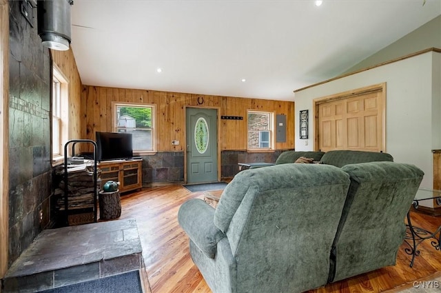 146 Mohawk Dr W, Webb, NY 13420 - living area with electric panel, wood walls, wood finished floors, and recessed lighting