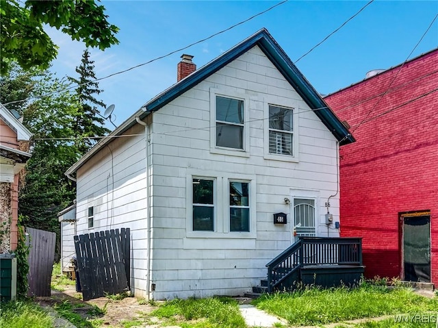 86 Deshler St, Buffalo, NY 14212 - rear view of house with a chimney
