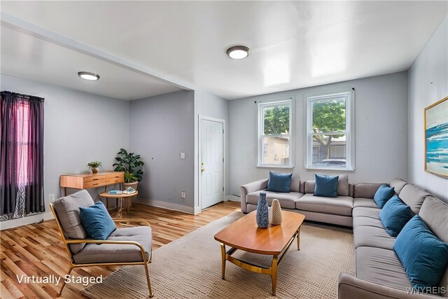86 Deshler St, Buffalo, NY 14212 - living room featuring light wood finished floors and baseboards