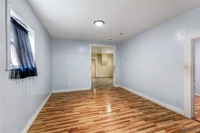 86 Deshler St, Buffalo, NY 14212 - unfurnished room featuring wood finished floors and baseboards