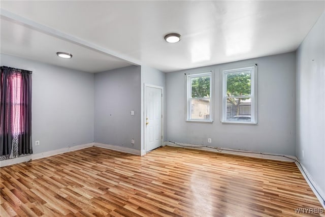 86 Deshler St, Buffalo, NY 14212 - empty room with light wood-type flooring and baseboards