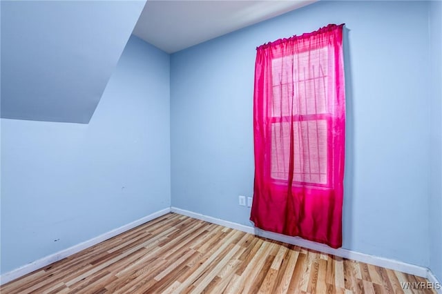 86 Deshler St, Buffalo, NY 14212 - spare room with wood finished floors and lofted ceiling