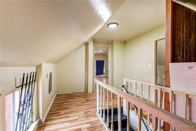 86 Deshler St, Buffalo, NY 14212 - corridor featuring light wood-type flooring, an upstairs landing, and lofted ceiling