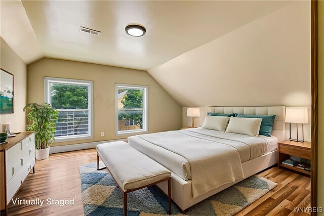 86 Deshler St, Buffalo, NY 14212 - bedroom with vaulted ceiling and light wood finished floors