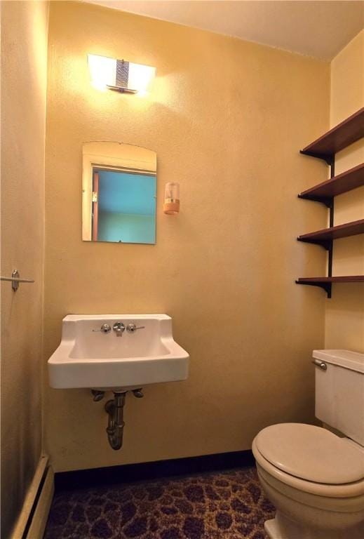 34 Crestview Dr W, Southport, NY 14871 - half bathroom with a sink and a baseboard radiator