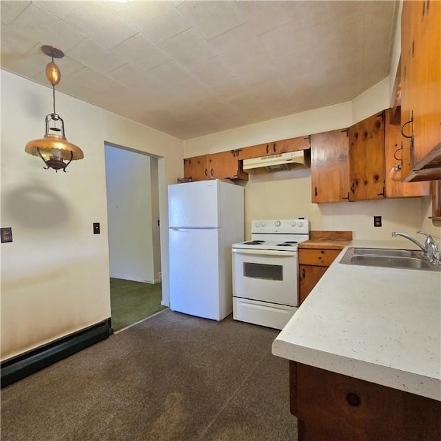 34 Crestview Dr W, Southport, NY 14871 - kitchen featuring white appliances, under cabinet range hood, brown cabinetry, light countertops, and dark carpet