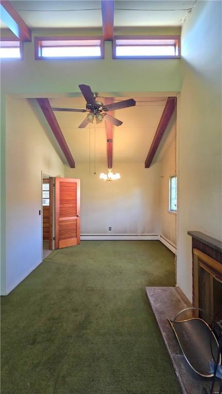 34 Crestview Dr W, Southport, NY 14871 - unfurnished living room with carpet floors, ceiling fan, healthy amount of natural light, and beam ceiling