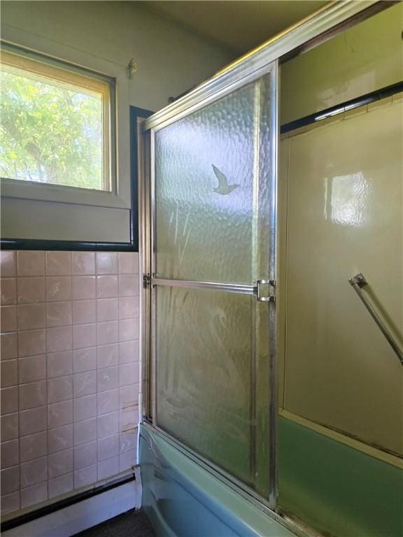 34 Crestview Dr W, Southport, NY 14871 - bathroom featuring bath / shower combo with glass door and baseboard heating