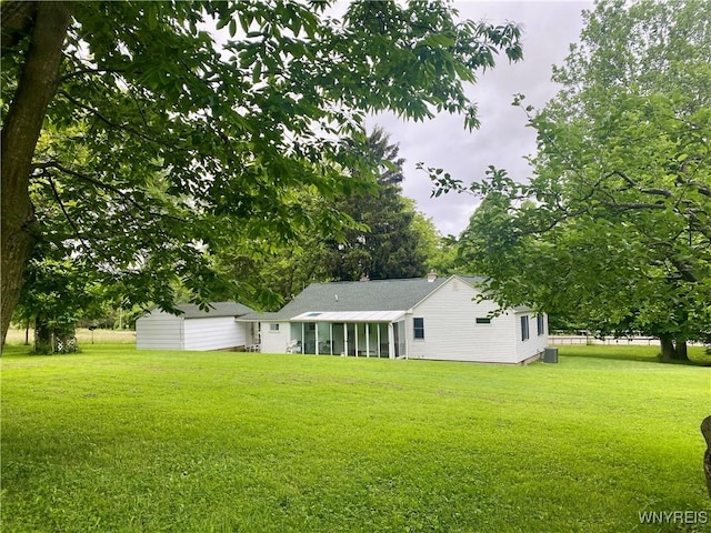 11671 Gowanda State Rd, North Collins, NY 14111 - view of grassy yard featuring a sunroom