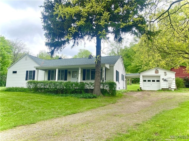 11671 Gowanda State Rd, North Collins, NY 14111 - view of front of property with dirt driveway, an outdoor structure, a detached garage, and a front lawn