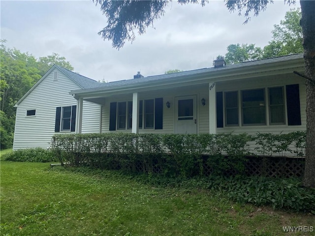 11671 Gowanda State Rd, North Collins, NY 14111 - back of property featuring a lawn and covered porch
