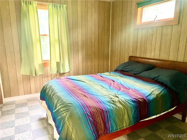 11671 Gowanda State Rd, North Collins, NY 14111 - bedroom with tile patterned floors and wooden walls