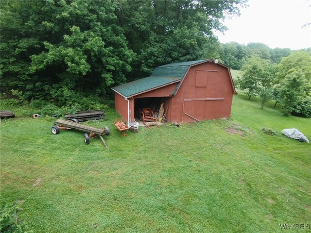 11671 Gowanda State Rd, North Collins, NY 14111 - view of barn with a lawn and a wooded view
