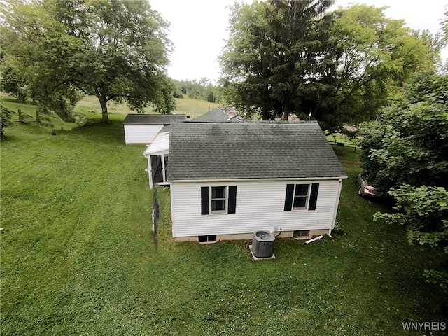11671 Gowanda State Rd, North Collins, NY 14111 - view of home's exterior with a shingled roof and a yard