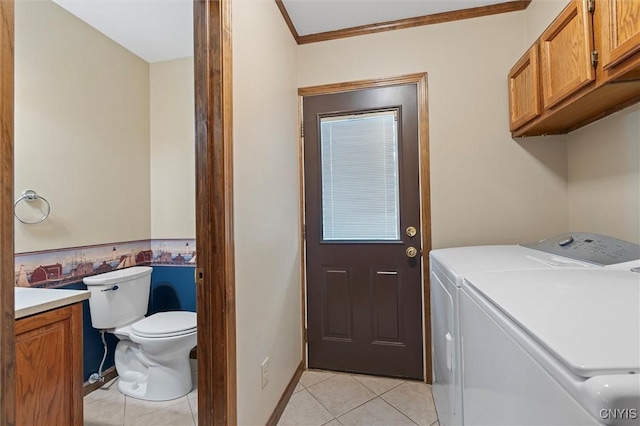 8013 Ginger Rd, Clay, NY 13090 - laundry area featuring independent washer and dryer, light tile patterned floors, and ornamental molding