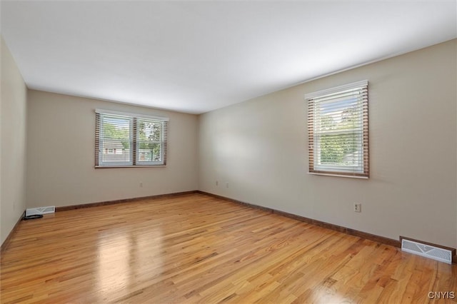 8013 Ginger Rd, Clay, NY 13090 - empty room featuring light wood-type flooring and baseboards