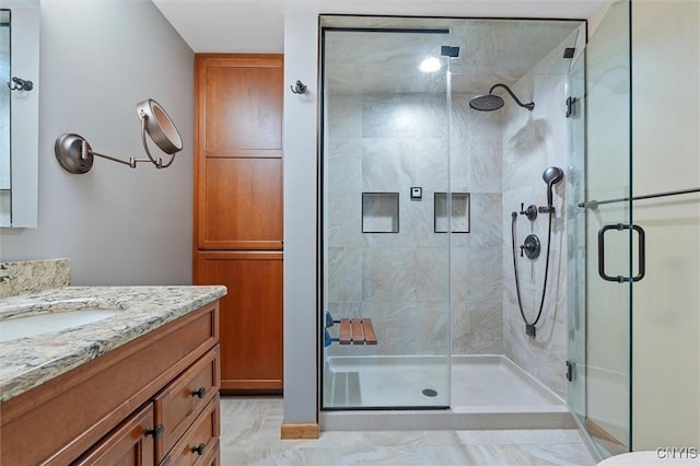 8013 Ginger Rd, Clay, NY 13090 - full bathroom featuring vanity, a shower stall, and marble finish flooring