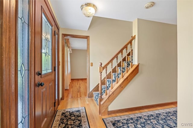 8013 Ginger Rd, Clay, NY 13090 - entrance foyer featuring wood finished floors and stairs