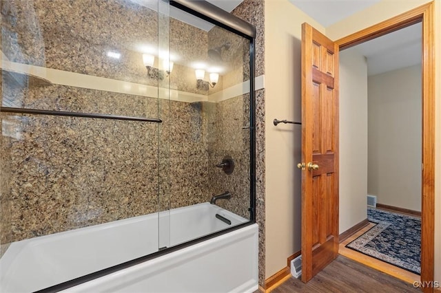 8013 Ginger Rd, Clay, NY 13090 - full bath with wood finished floors and shower / bath combination with glass door