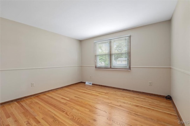 8013 Ginger Rd, Clay, NY 13090 - unfurnished room with wood finished floors and baseboards