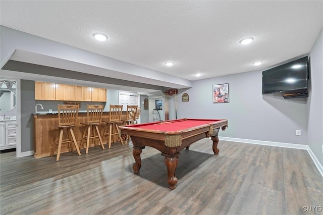 8013 Ginger Rd, Clay, NY 13090 - playroom with wet bar, wood finished floors, billiards table, a textured ceiling, and recessed lighting