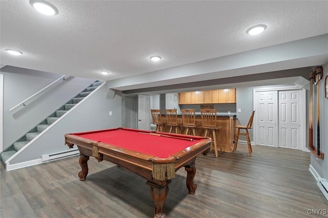 8013 Ginger Rd, Clay, NY 13090 - recreation room with a textured ceiling, wood finished floors, bar, a baseboard heating unit, and billiards