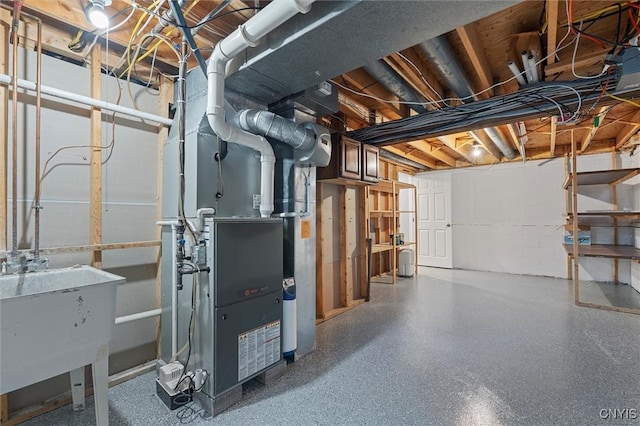 8013 Ginger Rd, Clay, NY 13090 - unfinished below grade area featuring a sink and heating unit