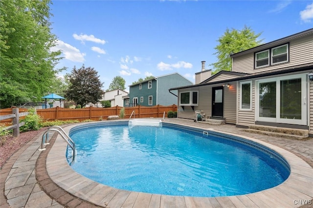 8013 Ginger Rd, Clay, NY 13090 - view of swimming pool with entry steps and a fenced backyard