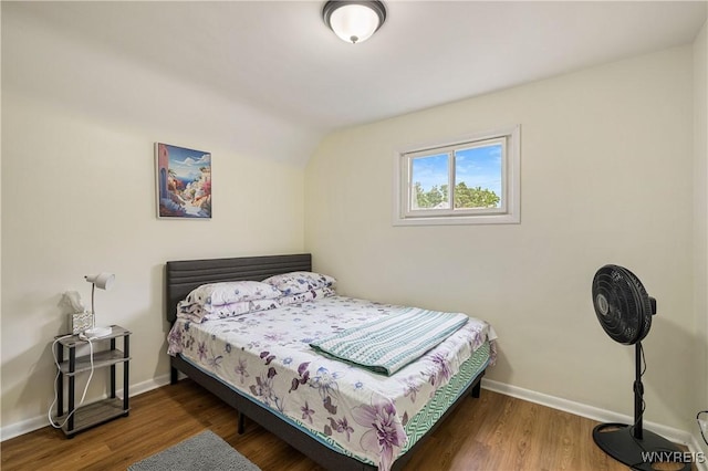 1004 19th St, Niagara Falls, NY 14301 - bedroom featuring lofted ceiling and wood finished floors