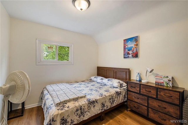 1004 19th St, Niagara Falls, NY 14301 - bedroom with wood finished floors and vaulted ceiling