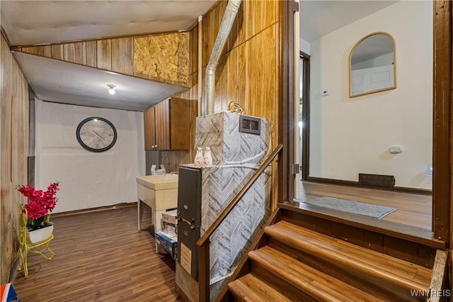 1004 19th St, Niagara Falls, NY 14301 - staircase with wood finished floors and wooden walls