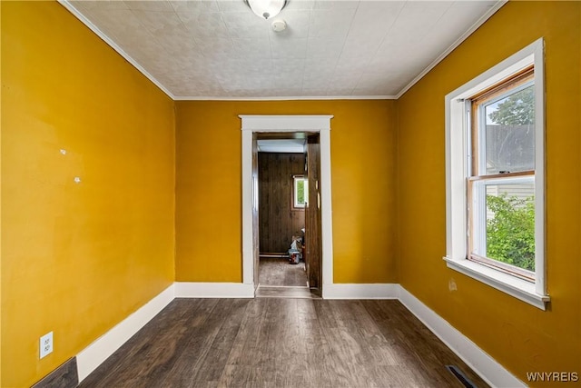 2511 Pine Ave, Niagara Falls, NY 14301 - unfurnished room featuring crown molding, dark wood-type flooring, plenty of natural light, and a smoke detector