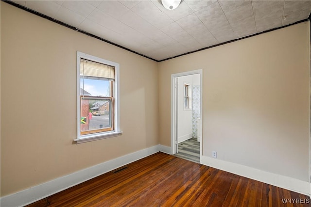 2511 Pine Ave, Niagara Falls, NY 14301 - spare room with dark wood-type flooring and baseboards