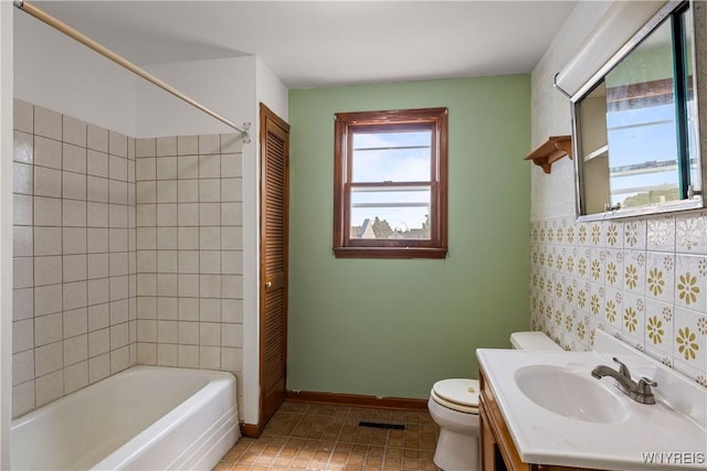 2511 Pine Ave, Niagara Falls, NY 14301 - full bathroom with vanity, tile patterned floors, and shower / tub combination