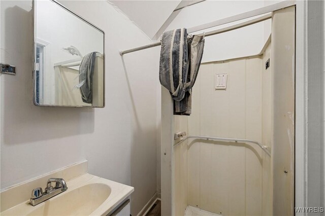 2511 Pine Ave, Niagara Falls, NY 14301 - bathroom featuring vanity and a shower