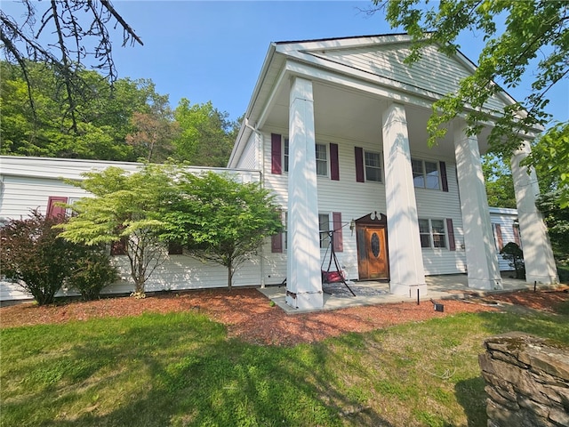 818 Larchmont Cir, Elmira, NY 14905 - rear view of house featuring a porch and a yard