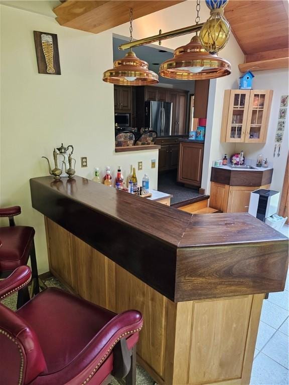 818 Larchmont Cir, Elmira, NY 14905 - indoor dry bar with stainless steel appliances, light tile patterned floors, and wooden ceiling
