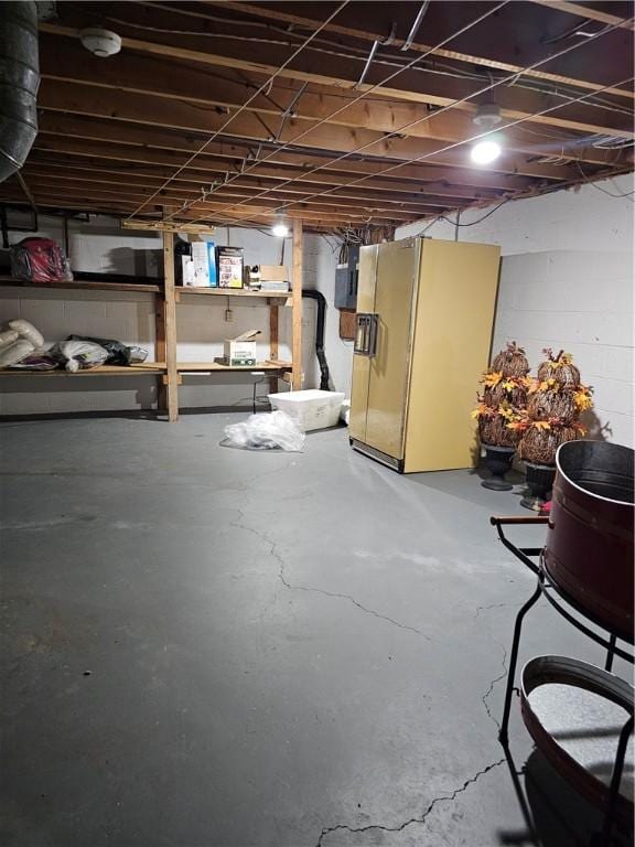 818 Larchmont Cir, Elmira, NY 14905 - unfinished below grade area featuring refrigerator with ice dispenser