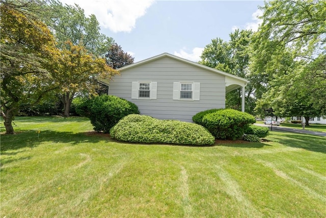 6 Meadowbrook Ter, North Dansville, NY 14437 - view of side of home featuring a yard