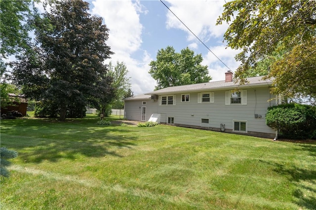 6 Meadowbrook Ter, North Dansville, NY 14437 - back of house with a chimney