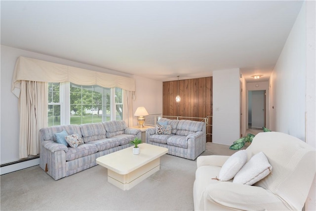 6 Meadowbrook Ter, North Dansville, NY 14437 - living room with light colored carpet and a baseboard heating unit